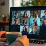 A person in a home office joins a vibrant team video call on a laptop, with a cozy atmosphere and teammates in diverse, inviting environments.